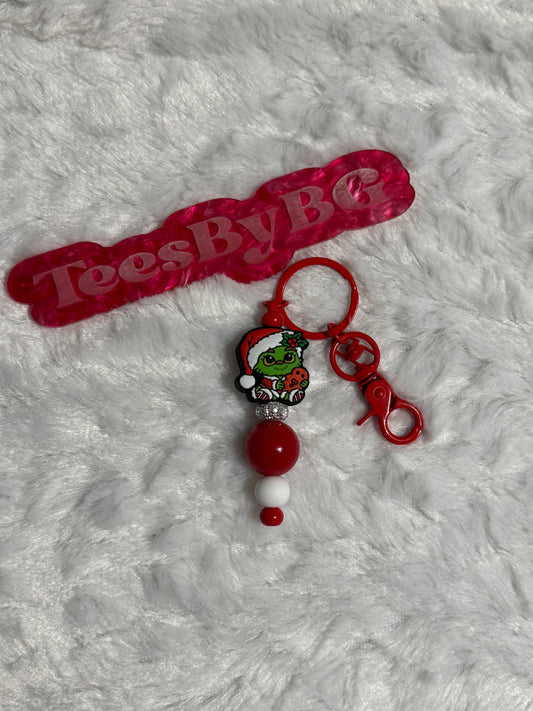 Baby Green Man on Red Keychain