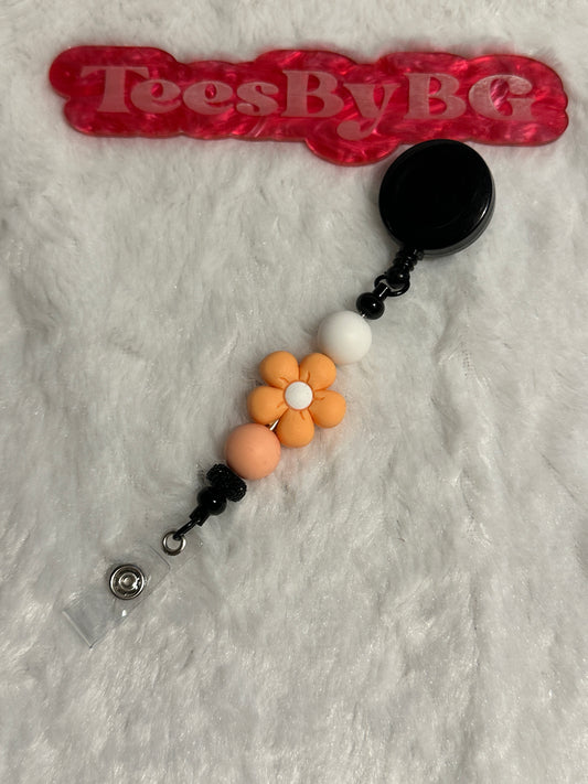 Orange Flower Badge Reel