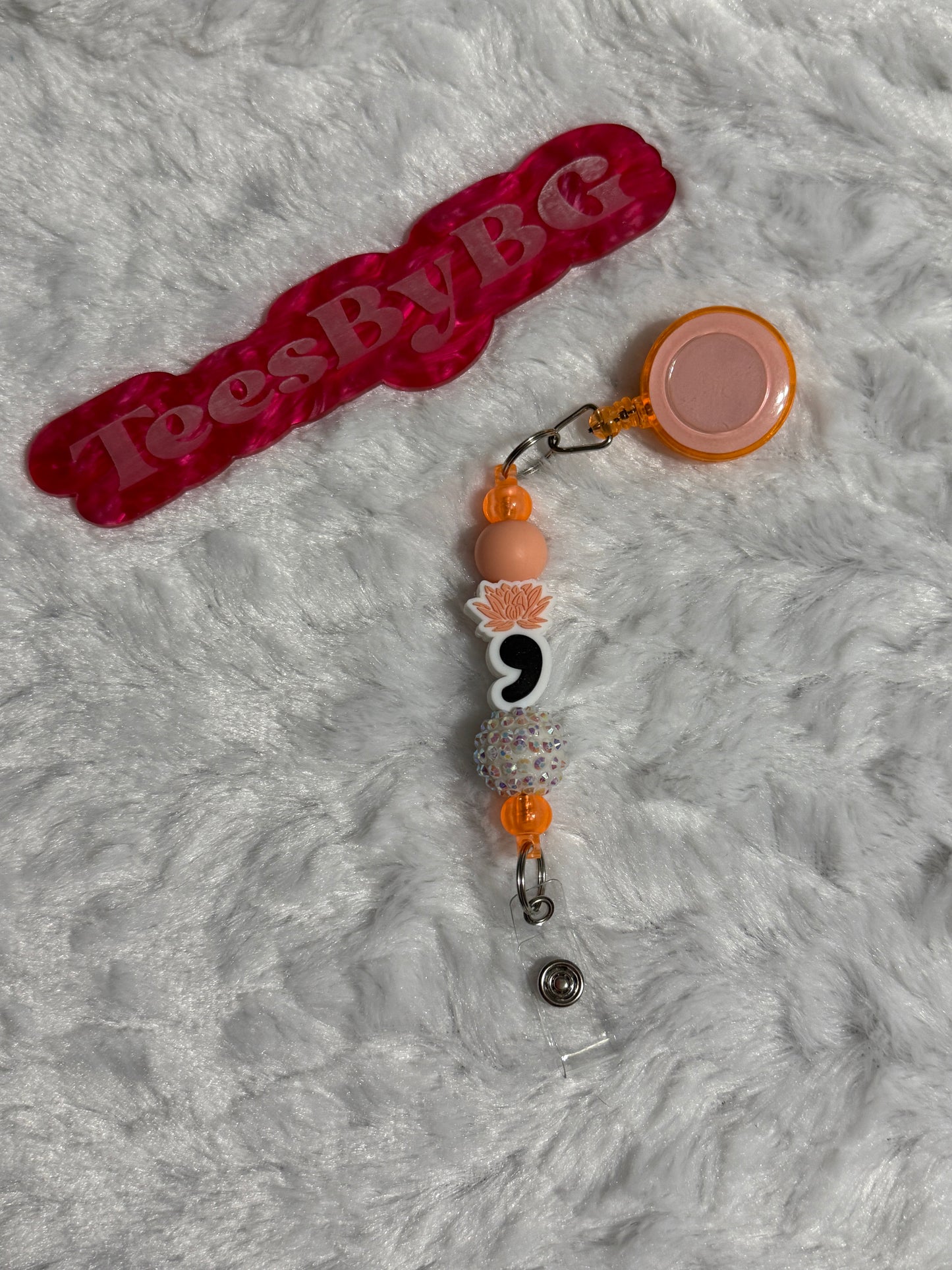 Orange Lotus Badge Reel